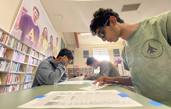 Students gathered all around in the library to vote for their own mock election all throughout the day.